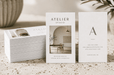 Thick stack and standing custom 12pt recycled uncoated business cards for Atelier Studio featuring interior design photography