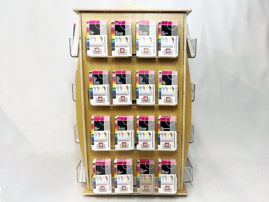 front view of 16-pocket birch plywood countertop card spinner loaded with sticker packs and cards - Clubcard Printing USA