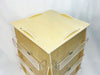 High-angle top view of empty birch plywood countertop rotating card display rack with acrylic pockets - Clubcard Printing USA