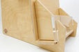 close-up view of the clear acrylic front panel and wood shelf detail of a 3-tier birch wood slim card display rack made in the USA. Clubcard Printing in Palm Springs