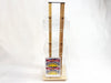 Front view of a 12-pocket birch plywood countertop card spinner display stand by Clubcard Palm Springs