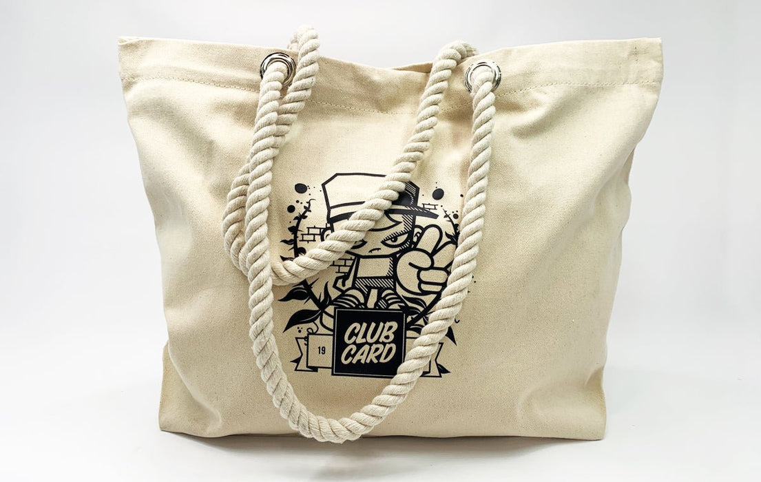 Natural canvas beach tote bag with thick rope handles custom printed with a black Clubcard mascot graphic
