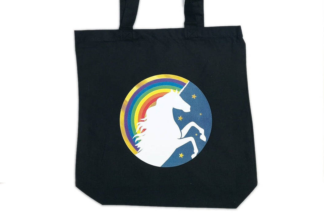Black cotton tote bag custom printed with a circular full-color rainbow and unicorn graphic
