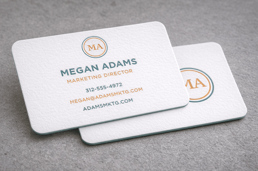 Two 20pt white cotton letterpress business cards with rounded corners