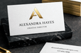 38pt white cotton letterpress business card featuring gold foil stamping for Alexandra Hayes