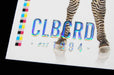 Close-up of Clubcard sample card on 19pt suede stock featuring CLUBCARD logo and small text in raised iridescent metallic foil