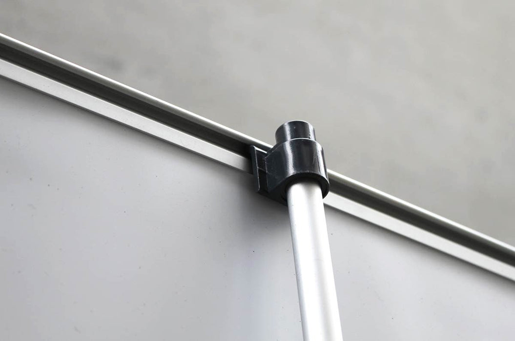 Close-up view of the top horizontal clamp and vertical support pole attachment mechanism on a retractable banner stand.  Clubcard Printing USA