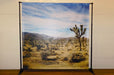 Adjustable telescopic frame backdrop banner stand set up for photo ops and event trade show displays. Clubcard Palm Springs